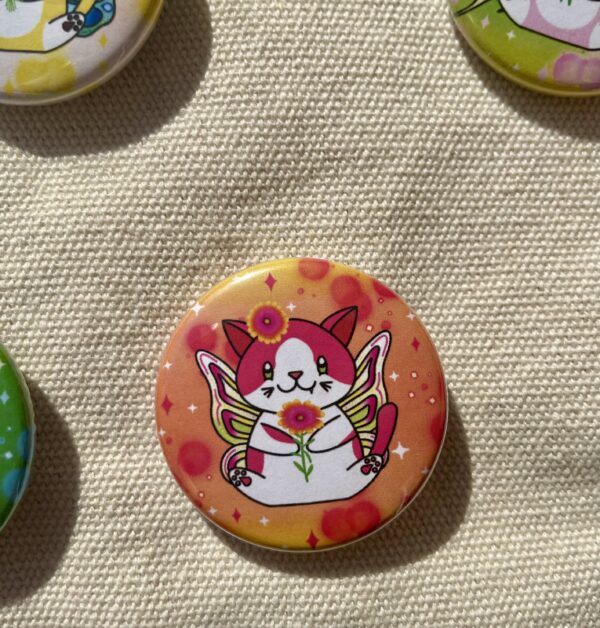 Badge rond Fée des marguerites du Cap - Collection Féerie florale