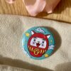 Badge Daruma rouge - Collection Asia Mania