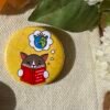 Badge rond Dominer le monde - Collection Moody Cat